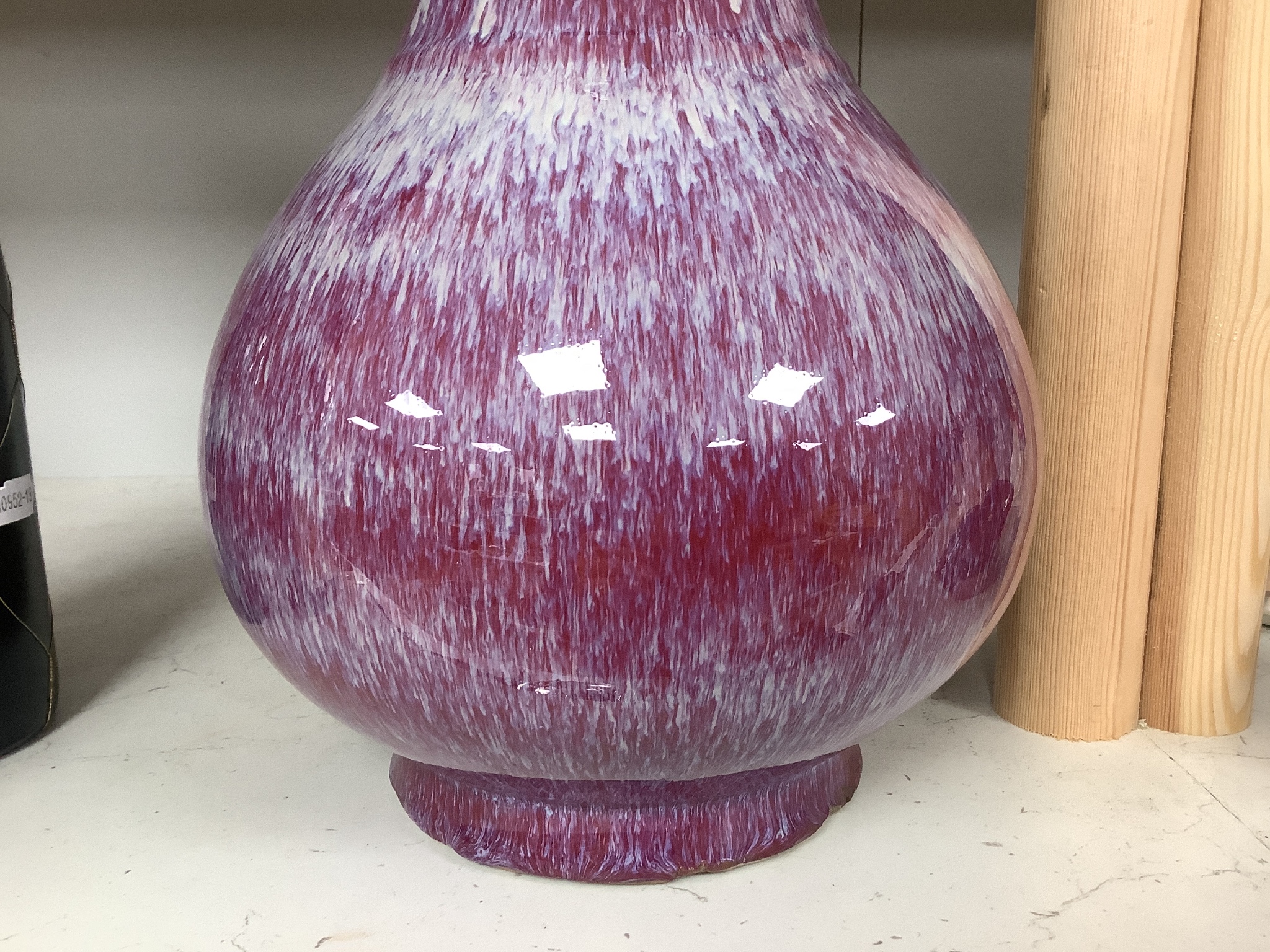 A Chinese crimson flambé glazed vase, 32cm